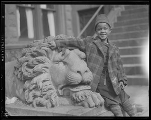 African-American boy with Stowe lion, South End, 511 Columbus Ave.