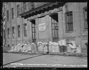 Garbage in front of apartment building, South End