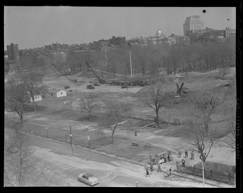 Boston Common: Playground from above showing the start of the underground garage showing mounds of sand