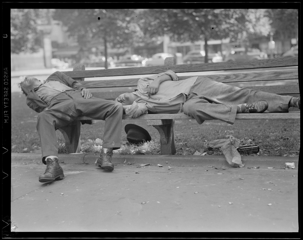 Two men passed out on park bench