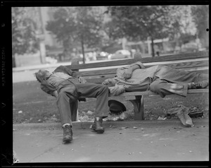 Two men passed out on park bench
