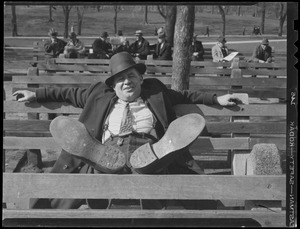 Man on bench on Boston Common