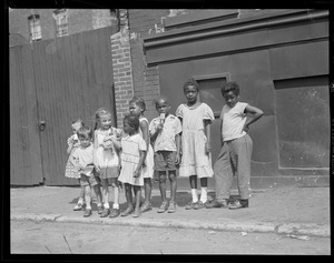 Black kids and white kids on street in South End