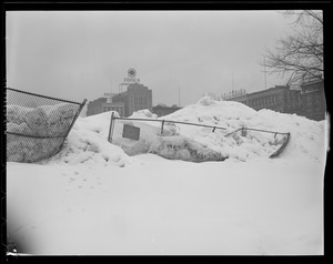 Snow piled high on baseball field, Boston Common