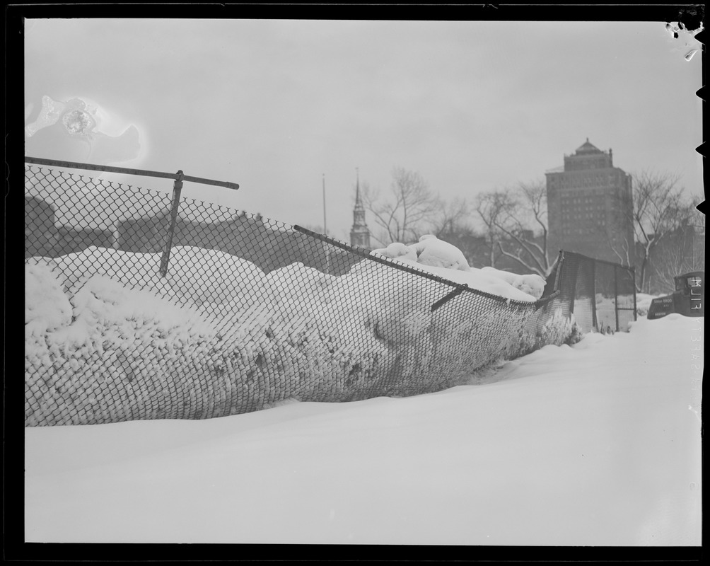 Snow piled high on baseball field, Boston Common