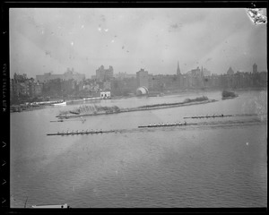 Esplanade and Hatch Shell from Cambridge showing oarsmen on Charles