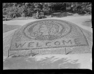 Flowers spell out "Welcome"