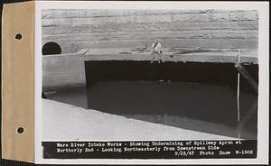 Ware River Intake Works, Shaft #8, showing undermining of spillway apron at northerly end, looking northeasterly from downstream side, Barre, Mass., Sep. 23, 1947