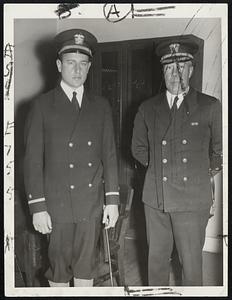 Charles F. Adams, Jr., (left) recently commissioned an ensign in the United States naval reserve, and the commanding officer of this branch of the service at the navy yard in Charlestown, Comdr. Howard G. Copeland.