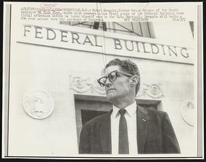 Robert Scoggin, former Grand Dragon of the South Carolina Ku Klux Klan, talks with newsmen on the front steps of the Federal Building here (3/24) afternoon before he turns himself over to the U.S. Marshall. Scoggin will begin a one year prison term for contempt of Congress.