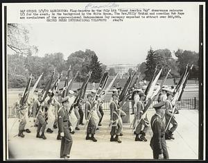 Washington: Flag-bearers in the July 4th "Honor America Day" observance rehearse 7/3 for the event. In the background is the White house. The Rev. Billy Graham and comedian Bob Hope are co-chairmen of the super-colossal Independence Day ceremony expected to attract over 200,000.