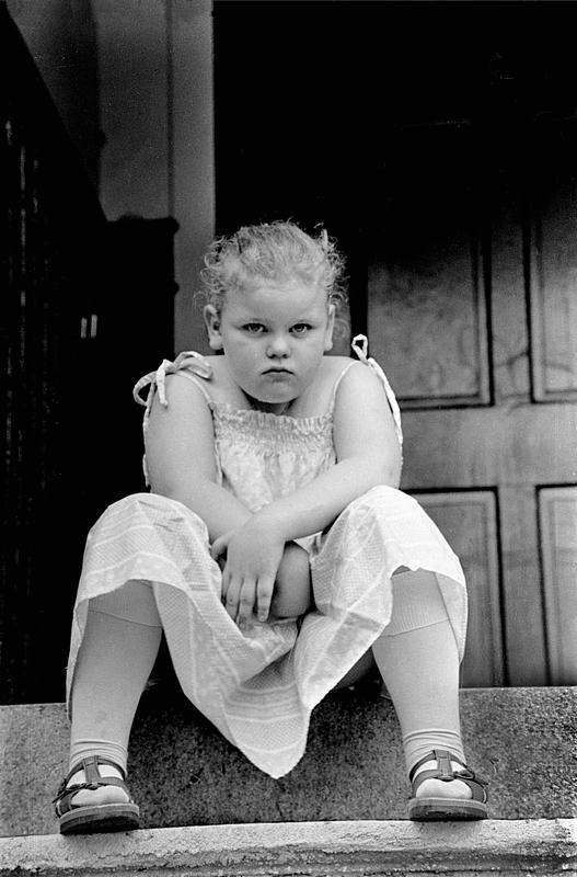 Little girl on porch