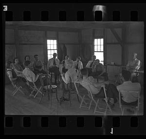 Meeting in a barn