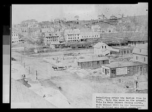 Rebuilding after the Natick fire in 1874