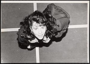 Young woman with backpack, shot from above