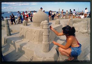 Ipswich, MA (circa 1982): Sand sculptures being made on Crane Beach