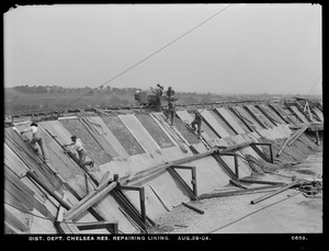 Distribution Department, Chelsea Reservoir, repairing lining, Chelsea, Mass., Aug. 29, 1904