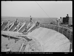 Distribution Department, Chelsea Reservoir, applying asphalt coating, Chelsea, Mass., Aug. 29, 1904