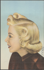 A blonde woman looking to the side