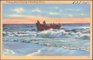 Fishing boats cresting a breaking wave
