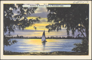 Sailing at sunset upon a peaceful lake