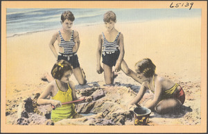 Sand diggers on the beach