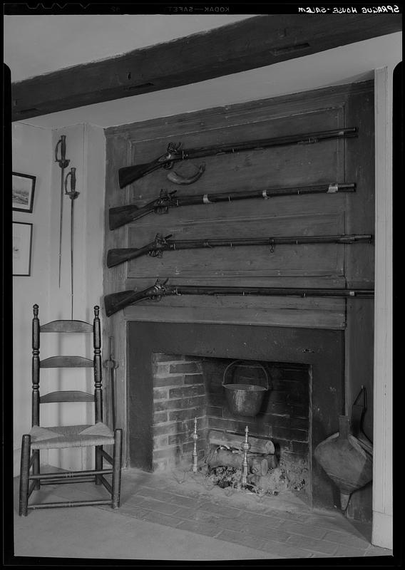 Sprague House, interior, guns over fireplace Digital Commonwealth