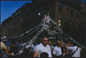 Effigy of St. Anthony in parade procession, North End, Boston