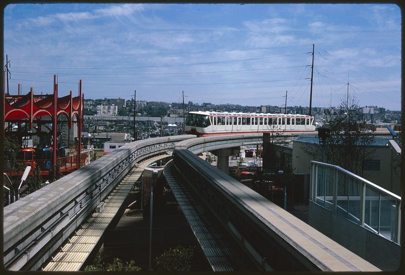 Seattle Center Monorail coming around curve on elevated track