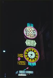 The Good Earth restaurant sign lit up at night