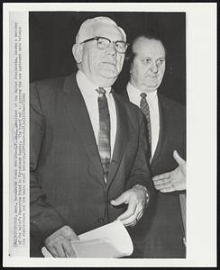 Leaves Board Meeting--I.W. Abel, president of the United Steelworks, leaves a meeting of the union's Executive Board in Pittsburgh Sunday. The board met to approve the new agreement made between the steelworkers and the basic steel industry.