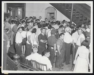 Lineup for Health Safety-The town hall in Southbridge was jammed with citizens as soon as the announcement came that typhoid shots would be available for all residents.