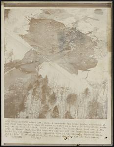 East Lee, Mass. A man-made dam broke Sunday afternoon at Mud Pond dumping more than 20 acres of water in a two mile destructive course, taking with it trees, homes, and cars. The flash flood took one life. Dead is Edward Gage, 60. His home was carried off its foundation and over Route 20, and dumped on the opposite side of the highway. Reported missinf is Mrs. Olive Courtinier, 55, who house was also hit and torn apart.