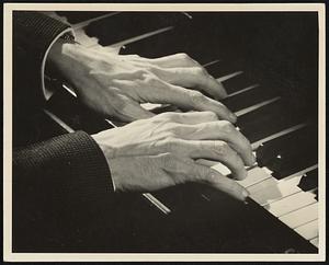 Jesus Maria Sanroma, the popular Spanish-American pianist, will be heard in Jordan Hall in his first local recital in five years on this Tuesday evening. Here his hands are photographed at the keyboard.