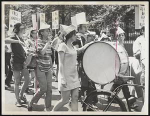 Drums and Kazoos kept the march beat for anti-war demonstrators walking through downtown Boston yesterday on the anniversary of the bombing of Nagasaki.