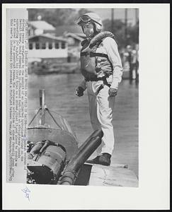 Eddie Sachs Enters New Field of Racing--Eddie Sachs, a veteran of driving racing cars, steps to the cockpit of an unlimited hydroplane Friday on the Detroit River. Sachs steered the 11,000-pound Such Crust at straightaway speeds approaching 140m.p.h. in his first trial as a driver, liked it, and plans to double up as a driver in top powerboat races. His outspoken criticism of winner Parnelli Jones after this years' Indianapolis 500 provoked a fistfight between them.
