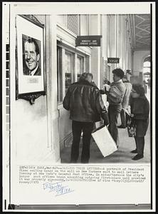 Mailing Their Letters--A portrait of President Nixon smiling hangs on the wall as New Yorkers wait to mail letters Tuesday at New York's General Post Office. In mid-afternoon the city's larger post offices began accepting outgoing first-class mail provided it was properly zip-coded.