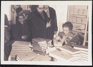 Ena Cane signing copies of her Whately history book