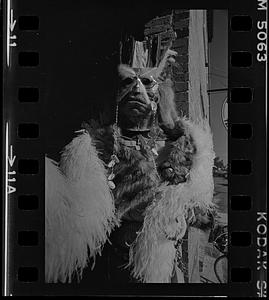 Shop decoration with mask and feathers