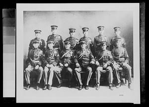 12 men in uniform, unidentified group