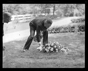 Flowers being laid on the ground by Richard E. Byrd