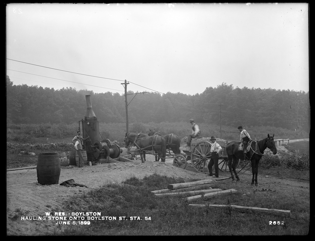 Wachusett Reservoir, hauling carts loaded with stone, by steam engine, Boylston Street, station 54; from the east, Boylston, Mass., Jun. 5, 1899
