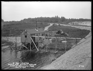 Wachusett Reservoir, North Dike, easterly portion, pump at Coachlace Pond, from the east in temporary road, Clinton, Mass., Jul. 13, 1899