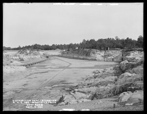 Distribution Department, Northern High Service Middlesex Fells Reservoir, west basin, from the north, at Dam No. 2; before filling, with concrete bottom and pipe line, Stoneham, Mass., Sep. 5, 1899