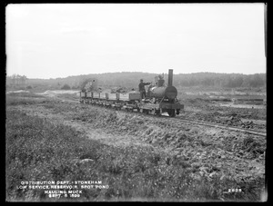 Distribution Department, Low Service Spot Pond Reservoir, hauling out muck with locomotive, from the south, Stoneham, Mass., Sep. 5, 1899