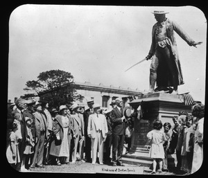 Capt. Thomas G. Frothingham hanging wreath on statue of Col. Prescott