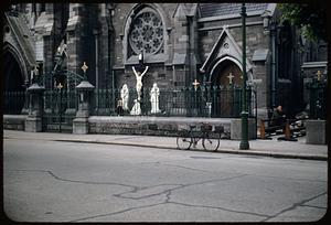 Church front, Dublin, man kneeling