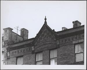 Brick building facade with false gable, Boston