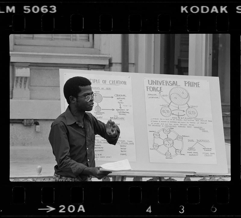 Religious fanatic lectures to passersby in Kenmore Square, Boston