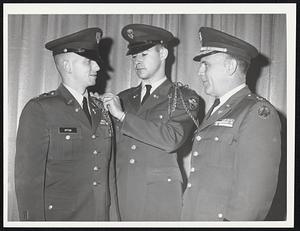 Notheastern Uni ROTC - 12th regiment of Pershing Rifles Commonwealth Armory. Incoming regimental commander Keven M. Upton of Somerville Junior at Northeastern Uni. Outgoing reg. cmdr. John F. McGivney of Quincy Senior at N.U. Col. Donald L. Adams prof. of Military Science at Northeastern Uni.